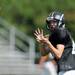 A Dexter High School football player participates in a drill during practice at the school on Friday, August 16, 2013. Melanie Maxwell | AnnArbor.com